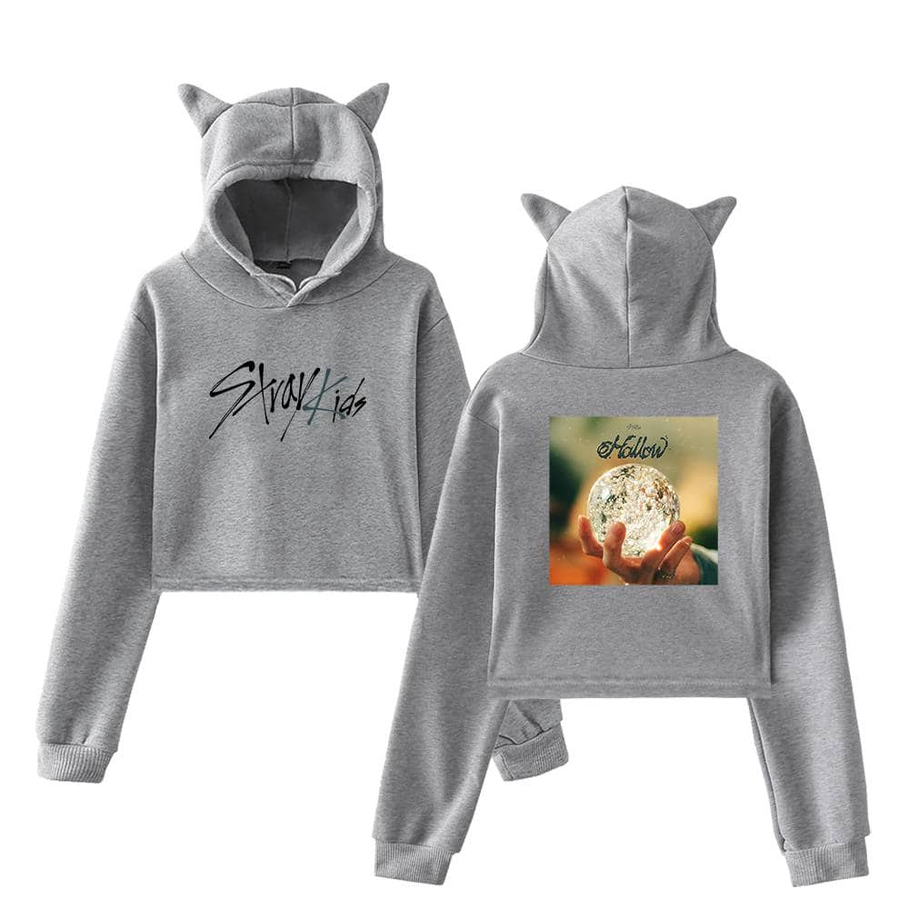 Stylish grey hoodie and sweatpants set with cat ear hood, featuring "Stray Kids" text and moon graphic, perfect for K-pop fans and merch collectors.