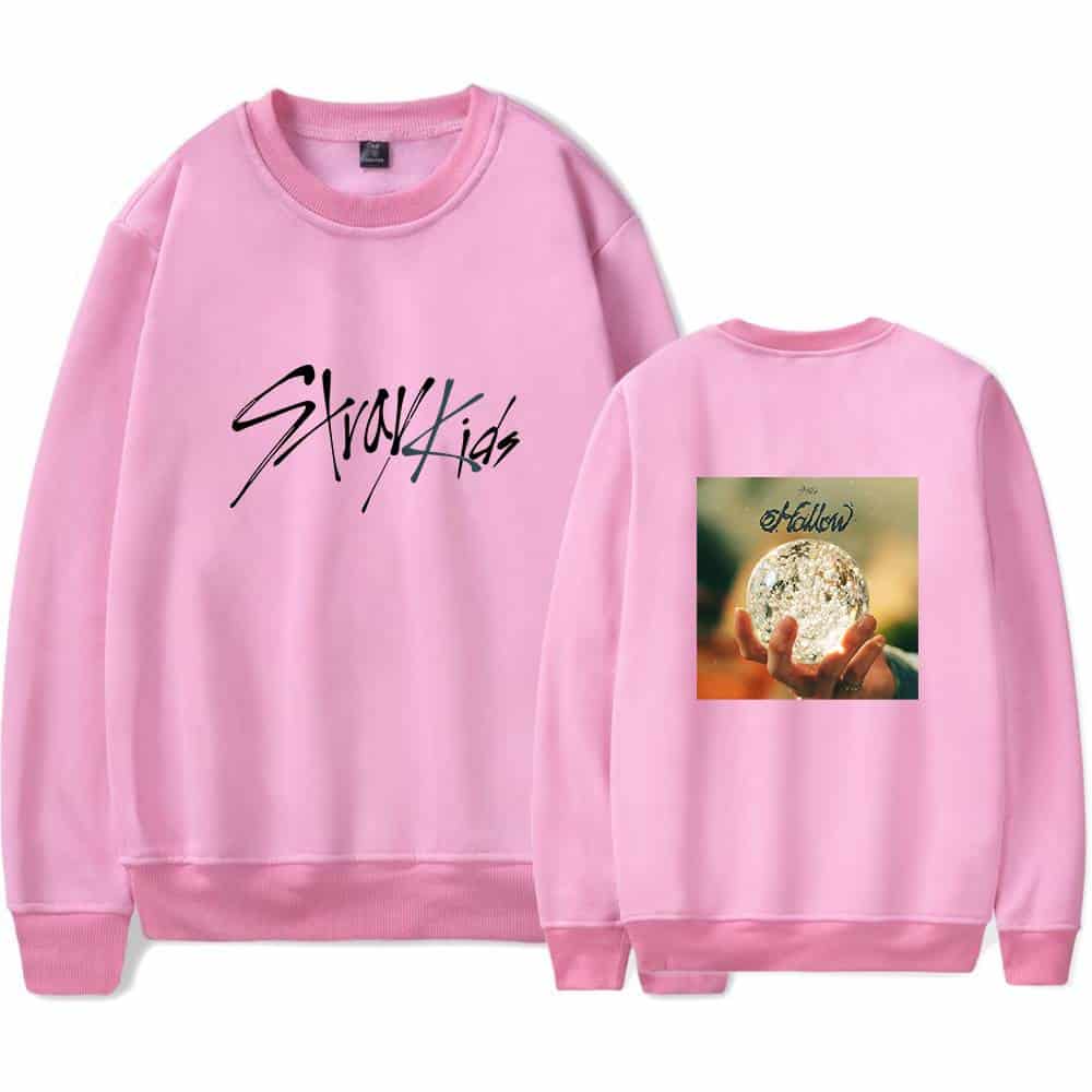 Stylish pink sweatshirt with Gothic text and moon design, perfect for K-pop fans and merchandise collectors.
